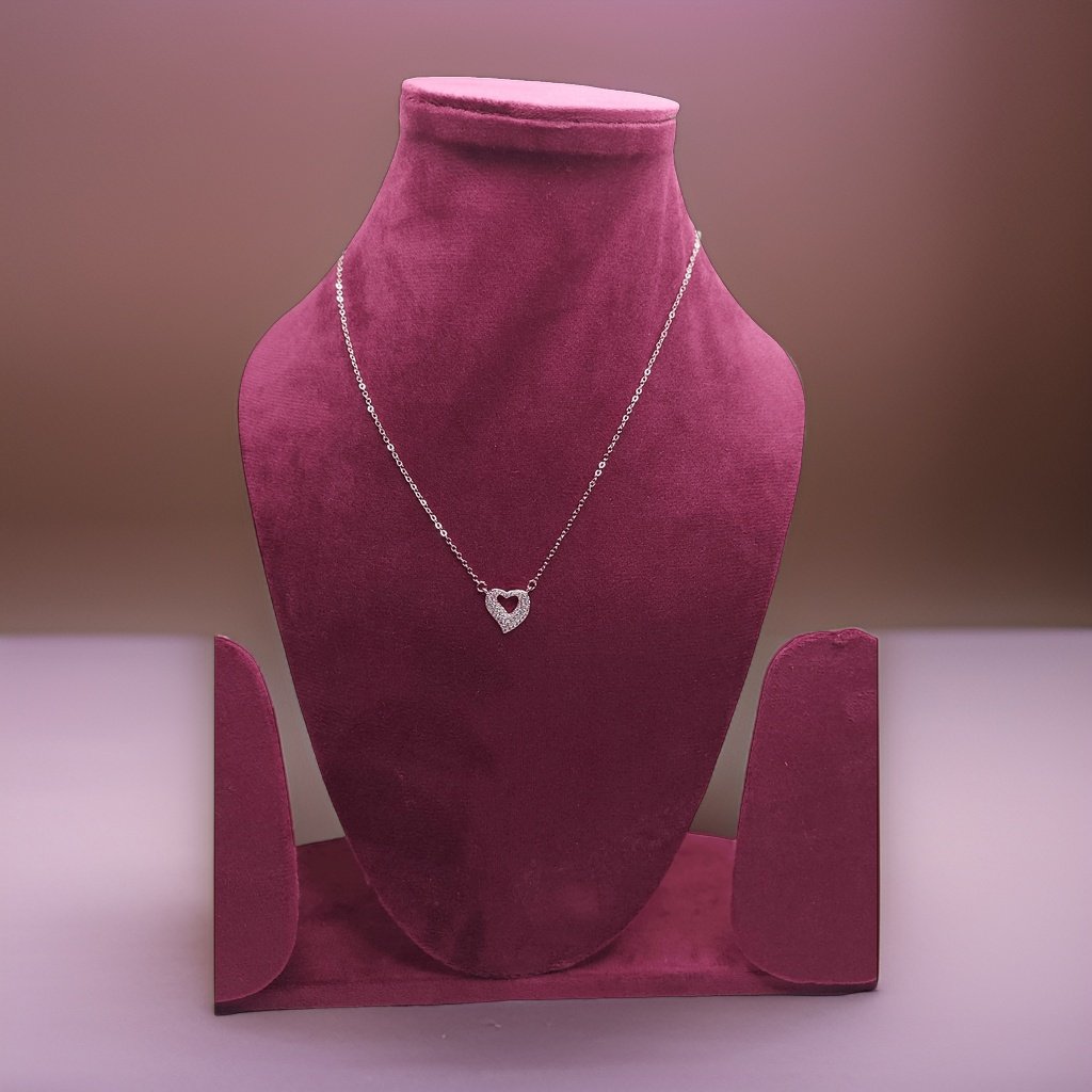 Add a touch of romance to your look with our <em>Elegant Heart Pendant</em>. This stunning piece features an elegant heart-shaped pendant that symbolizes love and affection. The adjustable chain ensures a comfortable fit, making it suitable for all occasions.