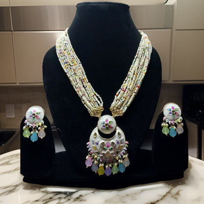 Elevate your look with our Kuhu Necklace. This stunning piece exudes sophistication with its timeless design and superior craftsmanship. Whether worn alone or layered with other necklaces, it adds a touch of glamour to any outfit.
