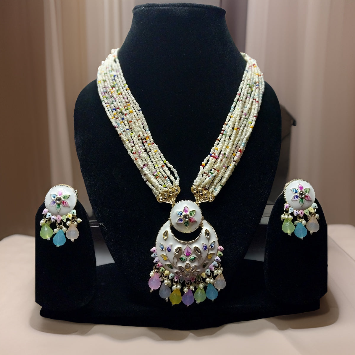 Elevate your look with our Kuhu Necklace. This stunning piece exudes sophistication with its timeless design and superior craftsmanship. Whether worn alone or layered with other necklaces, it adds a touch of glamour to any outfit.