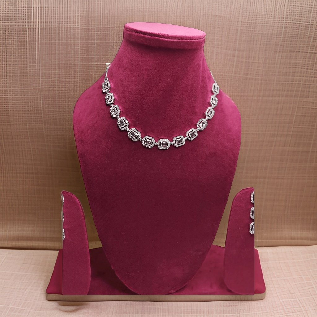 Embrace sophistication with our American Diamond Kuhu's Style Necklace. Featuring a timeless design with American diamond accents, this necklace adds a touch of glamour to any ensemble. The adjustable length ensures a comfortable fit, making it suitable for all occasions.