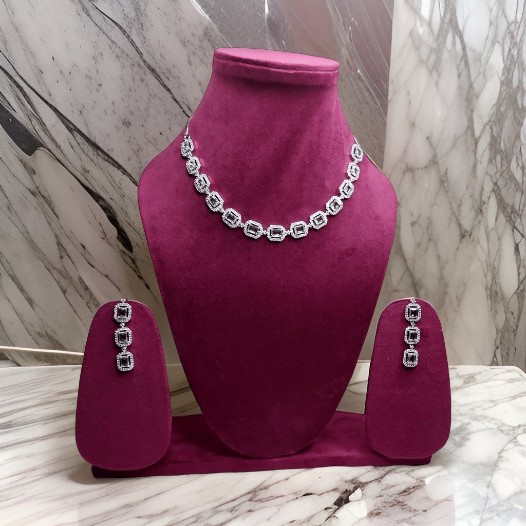 Embrace sophistication with our American Diamond Kuhu's Style Necklace. Featuring a timeless design with American diamond accents, this necklace adds a touch of glamour to any ensemble. The adjustable length ensures a comfortable fit, making it suitable for all occasions.
