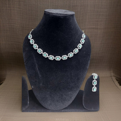 Make a bold statement with our Blue American Diamond Necklace. This eye-catching piece features blue American diamond accents that sparkle and shine. The adjustable chain ensures a perfect fit, making it suitable for all necklines.