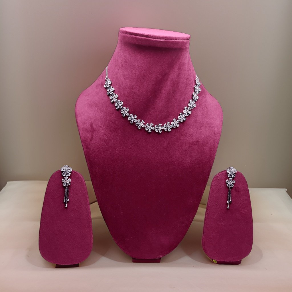Add a touch of whimsy to your look with our Butler and Wilson Daisy Necklace. This playful piece features daisy-shaped charms that add a cheerful vibe to any ensemble. The adjustable length ensures a comfortable fit, making it suitable for all occasions.