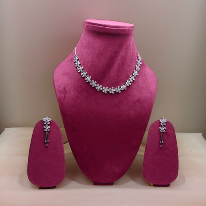 Add a touch of whimsy to your look with our Butler and Wilson Daisy Necklace. This playful piece features daisy-shaped charms that add a cheerful vibe to any ensemble. The adjustable length ensures a comfortable fit, making it suitable for all occasions.