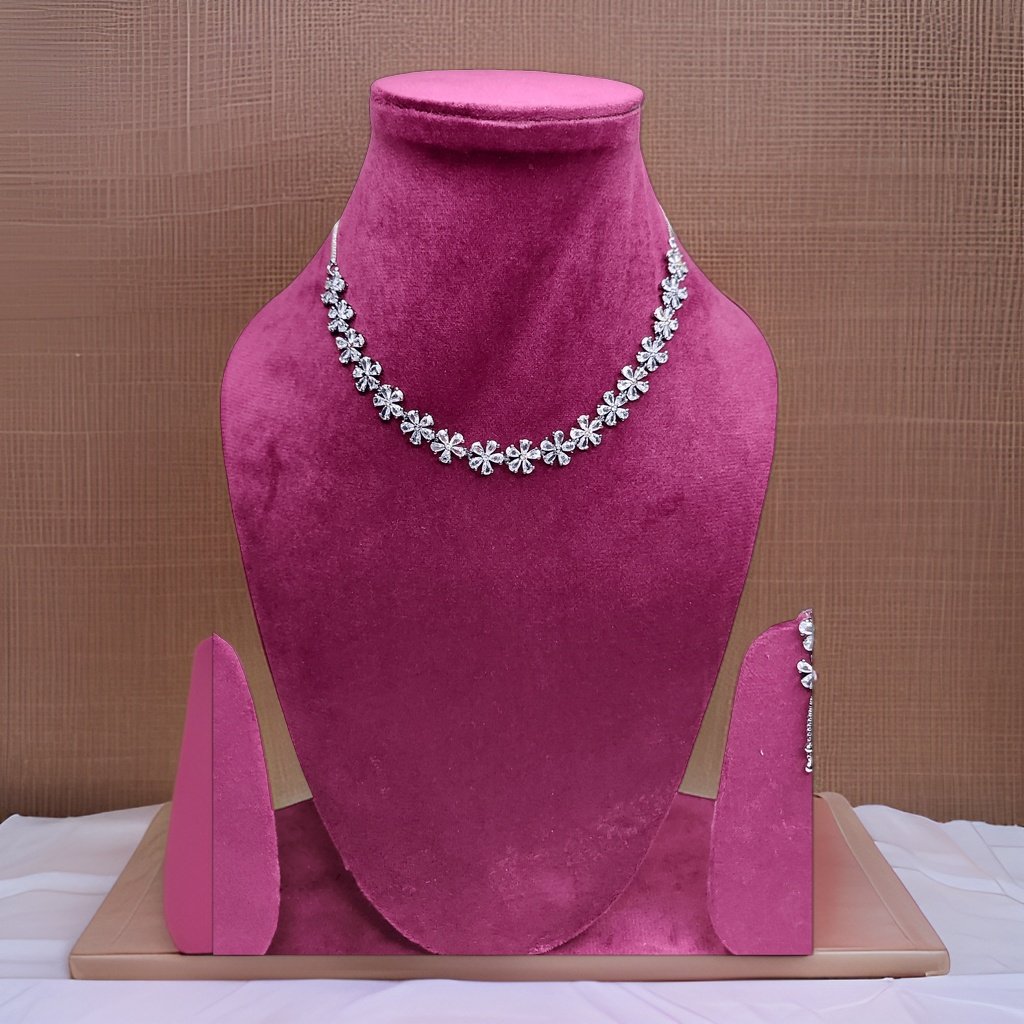 Add a touch of whimsy to your look with our Butler and Wilson Daisy Necklace. This playful piece features daisy-shaped charms that add a cheerful vibe to any ensemble. The adjustable length ensures a comfortable fit, making it suitable for all occasions.