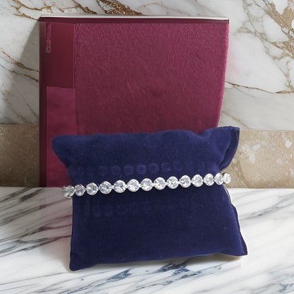 Make a fashion statement with our Circle Shaped Diamond Look Like Bracelet. With its eye-catching circular design and diamond-like details, this bracelet adds a touch of elegance to any look. The adjustable length ensures a comfortable fit, making it suitable for all occasions.