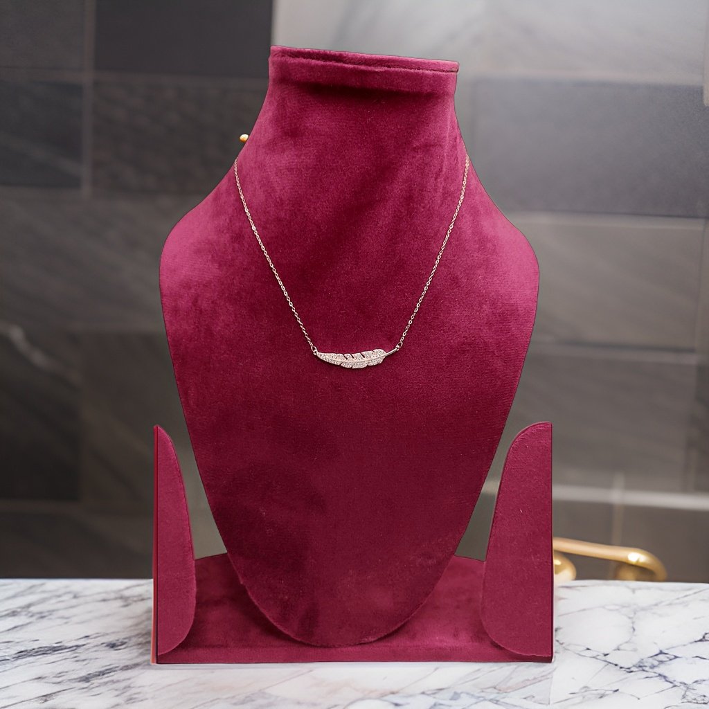 Channel your free-spirited style with our Feather Sterling Pendant. This delicate piece features a sterling silver feather pendant that adds a bohemian vibe to any look. The adjustable chain ensures a comfortable fit, making it suitable for all occasions.