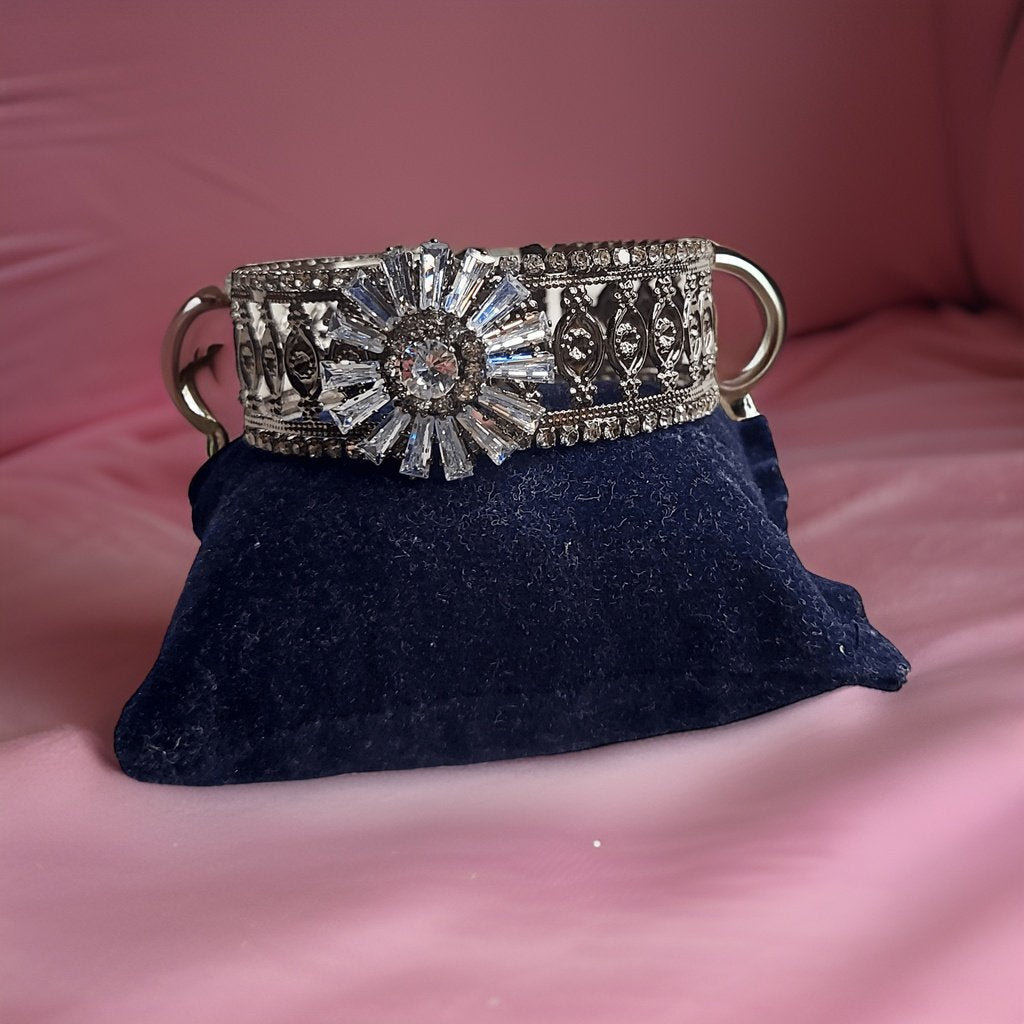 Make a bold statement with our Kuhu Designer Bracelet. This eye-catching piece features a unique and intricate design that showcases your individual style. The adjustable length ensures a comfortable fit, making it suitable for all occasions.