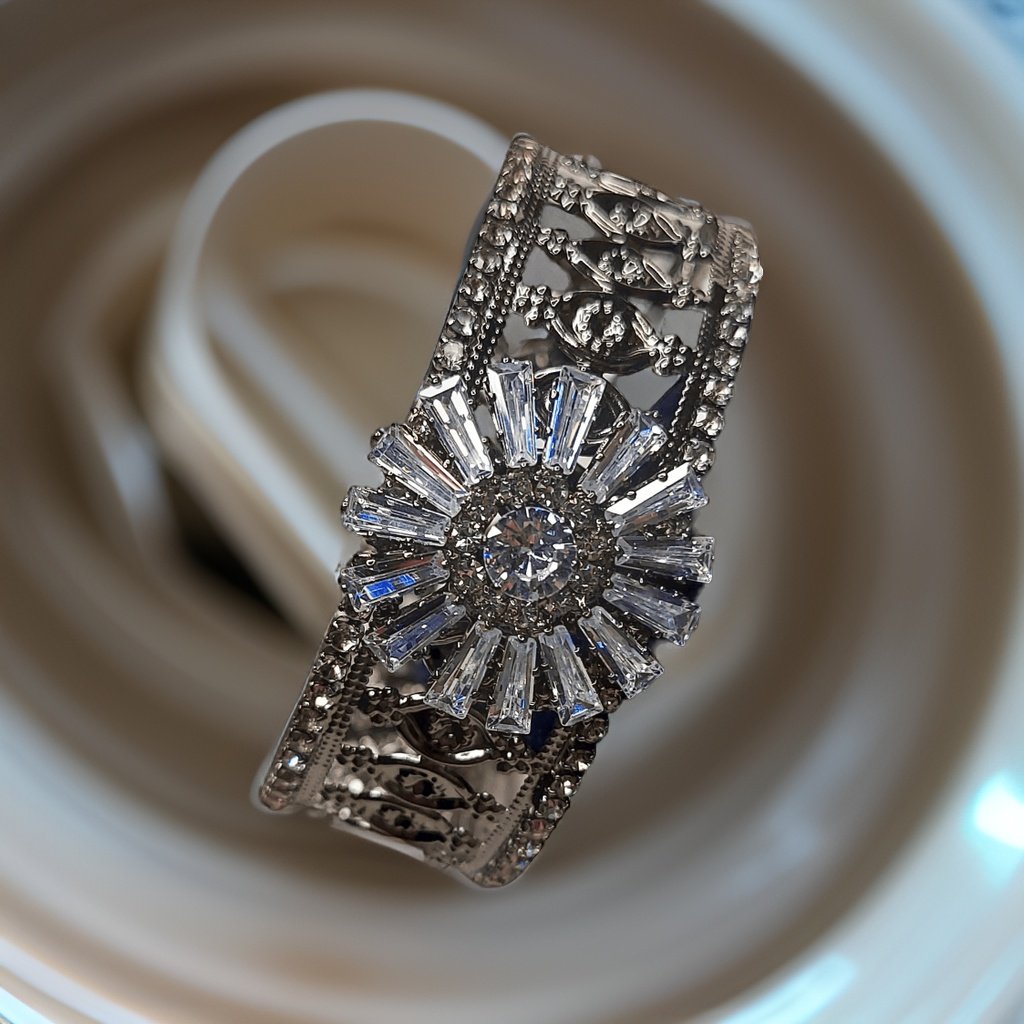 Make a bold statement with our Kuhu Designer Bracelet. This eye-catching piece features a unique and intricate design that showcases your individual style. The adjustable length ensures a comfortable fit, making it suitable for all occasions.