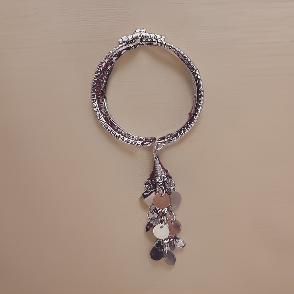 Make a bold statement with our Kuhu Designer Bracelet. This eye-catching piece features a unique and intricate design that showcases your individual style. The adjustable length ensures a comfortable fit, making it suitable for all occasions.