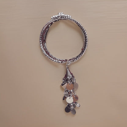 Make a bold statement with our Kuhu Designer Bracelet. This eye-catching piece features a unique and intricate design that showcases your individual style. The adjustable length ensures a comfortable fit, making it suitable for all occasions.