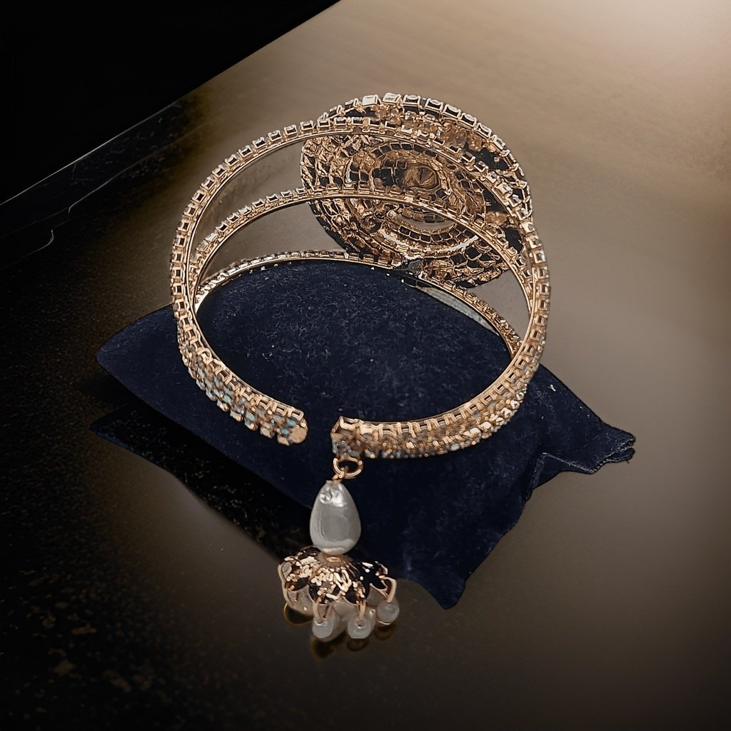 Add a touch of luxury to your ensemble with our Kuhu Diamond Look Like Bracelet. Featuring diamond-like accents, this bracelet exudes elegance and sophistication. The adjustable clasp ensures a comfortable fit, making it suitable for everyday wear or special occasions.