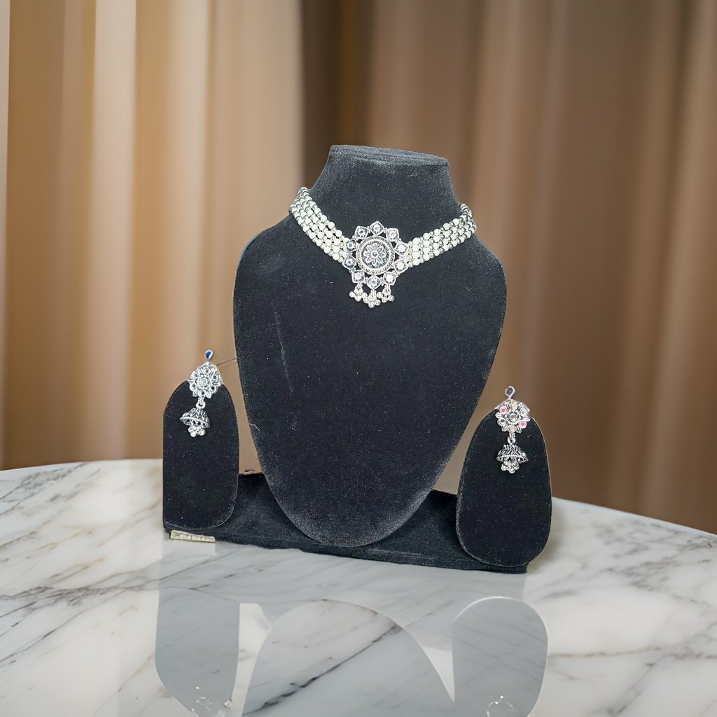 Elevate your look with our Kuhu Necklace. This stunning piece exudes sophistication with its timeless design and superior craftsmanship. Whether worn alone or layered with other necklaces, it adds a touch of glamour to any outfit.