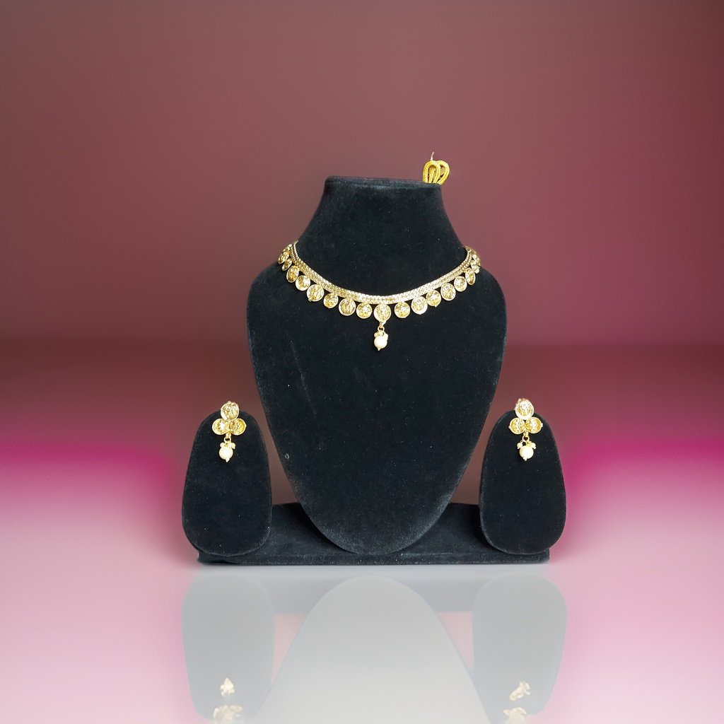 Elevate your look with our Kuhu Necklace. This stunning piece exudes sophistication with its timeless design and superior craftsmanship. Whether worn alone or layered with other necklaces, it adds a touch of glamour to any outfit.
