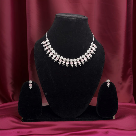 Add a pop of color to your ensemble with our Pink Stylish American Diamond Necklace. This stylish piece features sparkling pink American diamond accents that catch the light beautifully. The adjustable length ensures a comfortable fit, making it suitable for all occasions.