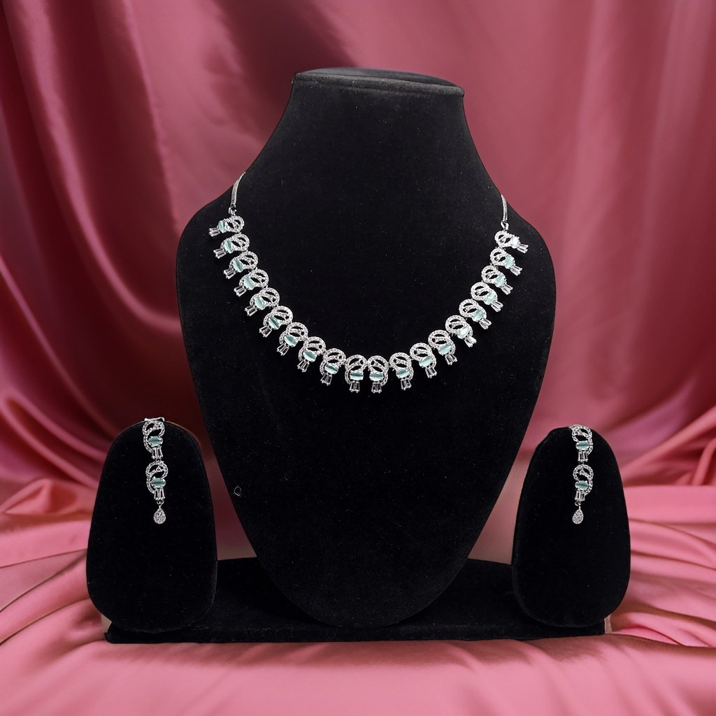 Elevate your look with our Premium American Diamond Necklace. This luxurious piece features high-quality American diamond accents that add instant glamour to any ensemble. The adjustable chain ensures a perfect fit, making it suitable for all necklines.