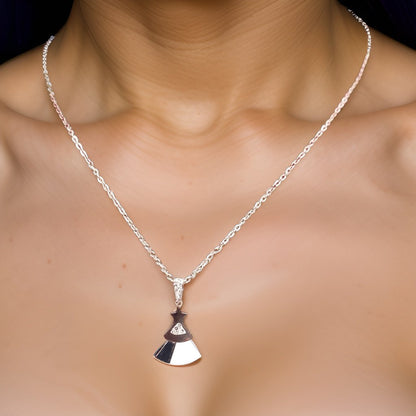 Make a statement with our Pyramid Sterling Pendant. This bold piece features a pyramid-shaped pendant crafted from sterling silver, adding a touch of edgy elegance to any look. The adjustable chain ensures a comfortable fit, making it suitable for all occasions.