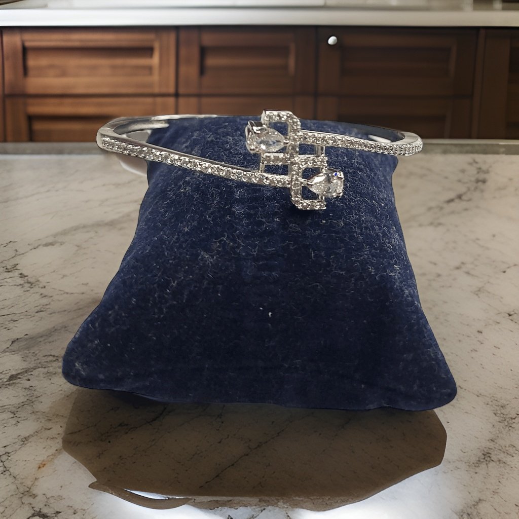Add a touch of sparkle to your wrist with our Round Cut Bracelet. Featuring round-cut stones set in a classic design, this bracelet exudes timeless elegance. The adjustable clasp ensures a comfortable fit, making it suitable for everyday wear or special occasions.