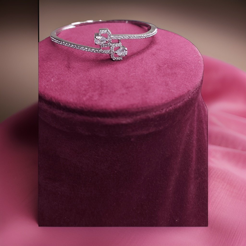 Add a touch of sparkle to your wrist with our Round Cut Bracelet. Featuring round-cut stones set in a classic design, this bracelet exudes timeless elegance. The adjustable clasp ensures a comfortable fit, making it suitable for everyday wear or special occasions.