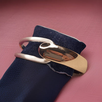 Add a touch of glamour to your ensemble with our Sterling Silver and Golden Look Bracelet. This versatile accessory features a combination of sterling silver and golden accents for a chic look. The adjustable length ensures a comfortable fit, making it suitable for all occasions.