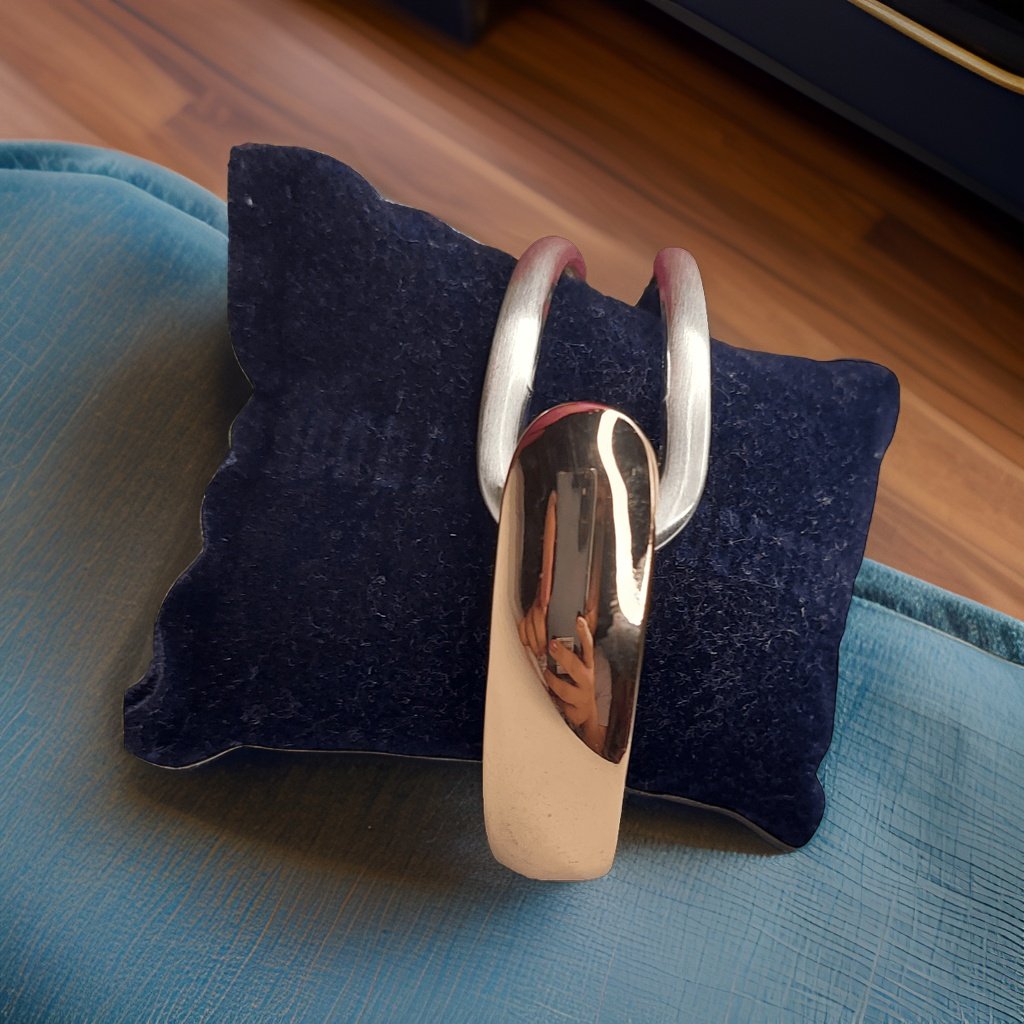 Add a touch of glamour to your ensemble with our Sterling Silver and Golden Look Bracelet. This versatile accessory features a combination of sterling silver and golden accents for a chic look. The adjustable length ensures a comfortable fit, making it suitable for all occasions.