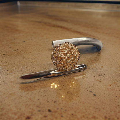 Add a touch of bohemian flair to your ensemble with our Wire Ball Wrap Bracelet. Featuring wire balls wrapped around your wrist, this bracelet adds texture and dimension to any look. The adjustable length ensures a comfortable fit, making it suitable for all occasions.
